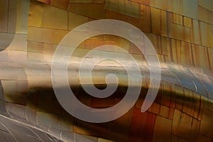 Curvy swirly colorful metallic plates abstract background