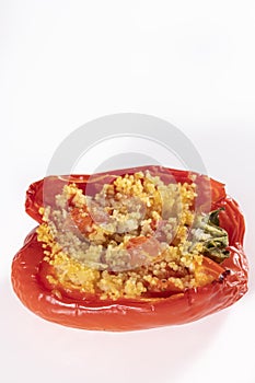 Cuscus, oven-roasted red pepper stuffed with couscous with vegetables