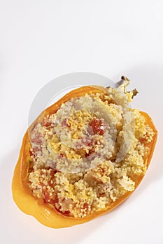 Cuscus, oven-roasted yellow pepper stuffed with couscous with vegetables