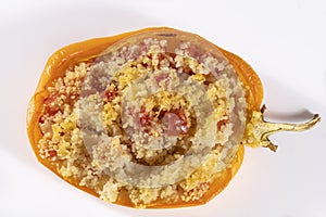 Cuscus, oven-roasted yellow pepper stuffed with couscous with vegetables