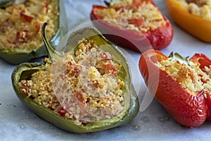 Cuscus, roasted peppers fresh from the oven stuffed with couscous with vegetables
