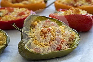 Cuscus, roasted peppers fresh from the oven stuffed with couscous with vegetables