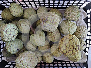 Custard apples in the basket photo