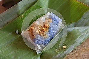 Custard rice. Sticky rice and egg custard wrapped in banana leaf.