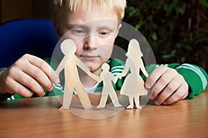 Custody, child with paper family photo