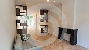 Custom designed room divider in high-end townhouse photo