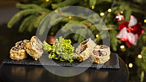 Custom sushi roll in tempura with nori, fresh salmon, tuna, avocado, masago caviar, drizzled with pineapple sauce with