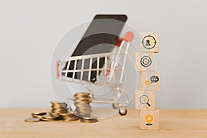Customer or buyer persona , online shopping , e-commerce concept. Sack of wooden cube block with business icon with blurred