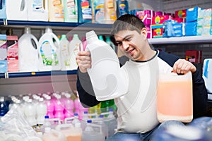 Customer buying detergents for laundry