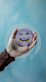 Customer delight Womans hand holds happy face icon, positive experience
