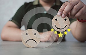 Customer experience concept. Happy client giving a positive review for five stars. User comment and feedback for review