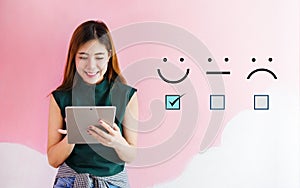 Customer experience concept, happy client woman holding digital