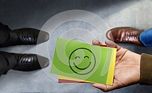 Customer Experiences Concept. Happy Client giving Excellent Rating Feedback on Card to a Businessman. Positive Review