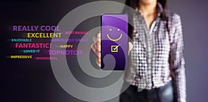 Customer Experiences Concept. Happy Female Client Giving Smiling Emoticon Rating, Positive Review via Smartphone. Client`s