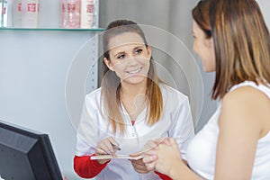 Customer having inquiry in dermatology clinic