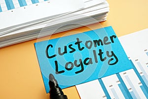 Customer loyalty concept. Pile of marketing documents