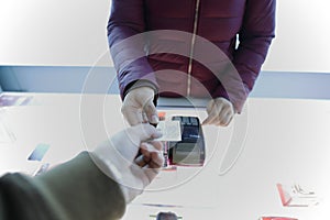 Customer paying card,Woman hand with credit card swipe through terminal for sale