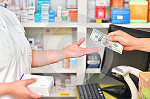 Customer paying for Medicaments in pharmacy