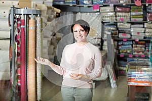 Customer posing near cloth winds