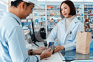 Customer purchases qualified prescription medical drugs from pharmacist.