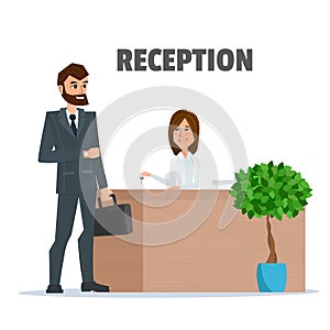 Customer receives a businessman the key at the reception a girl