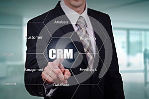 Customer relationship management concept man selecting CRM.