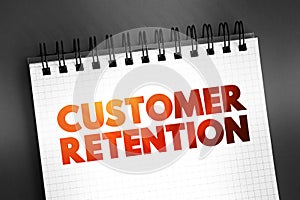Customer Retention - ability of a company or product to retain its customers over some specified period, text on notepad, concept
