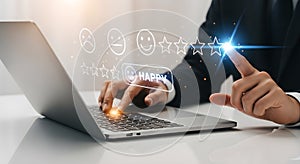 Customer Satisfaction 5-Star Rating Business Feedback on Digital Laptop Screen with Human Hand