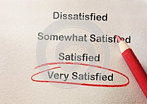 Customer satisfaction survey with Very Satisfied text circled in red pencil