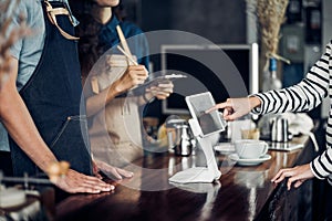 customer self service order drink menu with tablet screen at cafe counter bar,seller coffee shop accept payment by