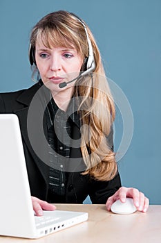 A customer service agent checks an order