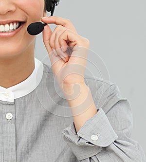 Customer service agent with headset on smiling