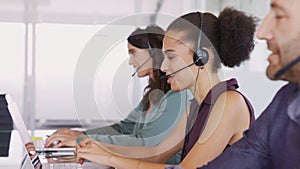Customer service agents on call working