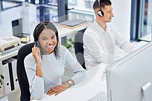Customer service, call center and happy woman at desk while consulting online for CRM, contact us or sales. Support team