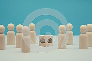 Customer service. Call centre. Round-the-clock help. Online support. Wooden figures, handset, email symbol on cube