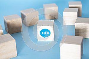 Customer service contact us icon on the cube wood keyboard