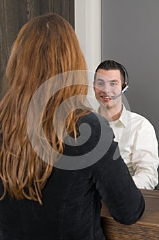 Customer at a service desk