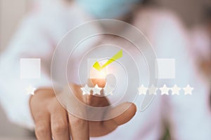 Customer service evaluation satisfaction feedback survey concept,businessman giving rating,happy icon 3 stars,smiley face emoticon