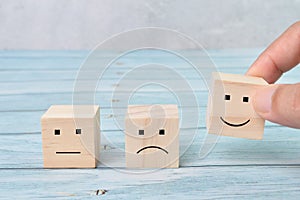 Customer service evaluation and satisfaction survey concepts. The client hand picked the happy face smile icon