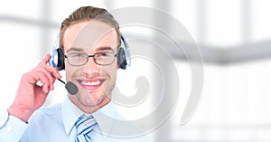 Customer service man with bright background in call center