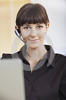 Customer Service Operator Wearing Telephone Headset