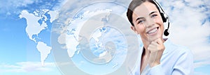 Customer service operator woman with headset smiling, world map