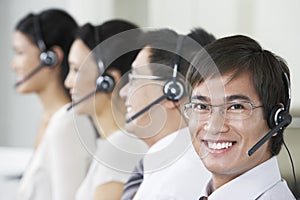 Customer Service Operators Wearing Headsets