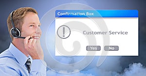 Customer service representative wearing headset by dialog box