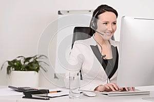 Customer service representative at work. Beautiful middle-aged c