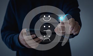 Customer service and Satisfaction concept, Business people touch the virtual screen on the happy Smile face icon