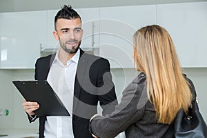 customer service talking to woman