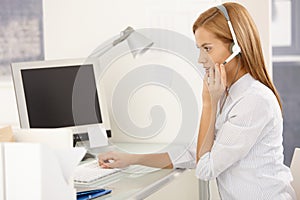 Customer service worker with headset