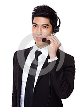 Customer services operator holding with microphone