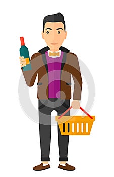 Customer with shopping basket and bottle of wine